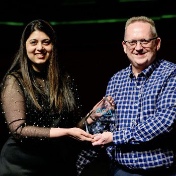 Farah Madon, President presenting the ACA Fellow award to Bruce Bromley at the ACA 2025 conference