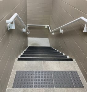 Fig 1 - Luminance contrast is provided to handrails to assist with wayfinding and safety
