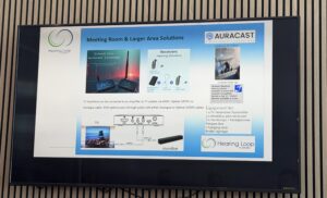 Photo of a screen showing presenter's main points